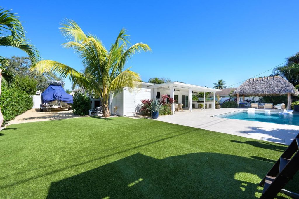 Photo of 319 Country Club Drive, Tequesta, FL 33469 (MLS # R10957514)