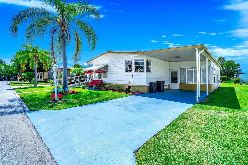 Photo of 570 Barb Ann Lane Ln, Port Saint Lucie, FL 34952 (MLS # R10807721)