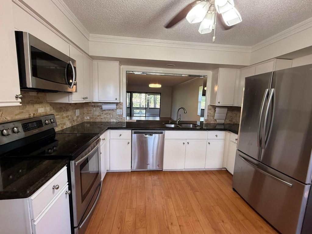 Photo of 6460 Aspen Glen Circle #104, Boynton Beach, FL 33437 (MLS # R11147019)