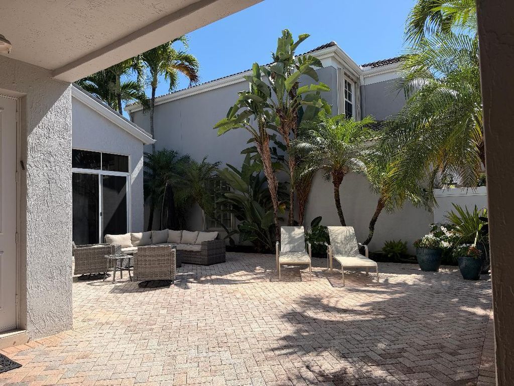 Photo of 4285 NW 62nd Road, Boca Raton, FL 33496 (MLS # B26021008)