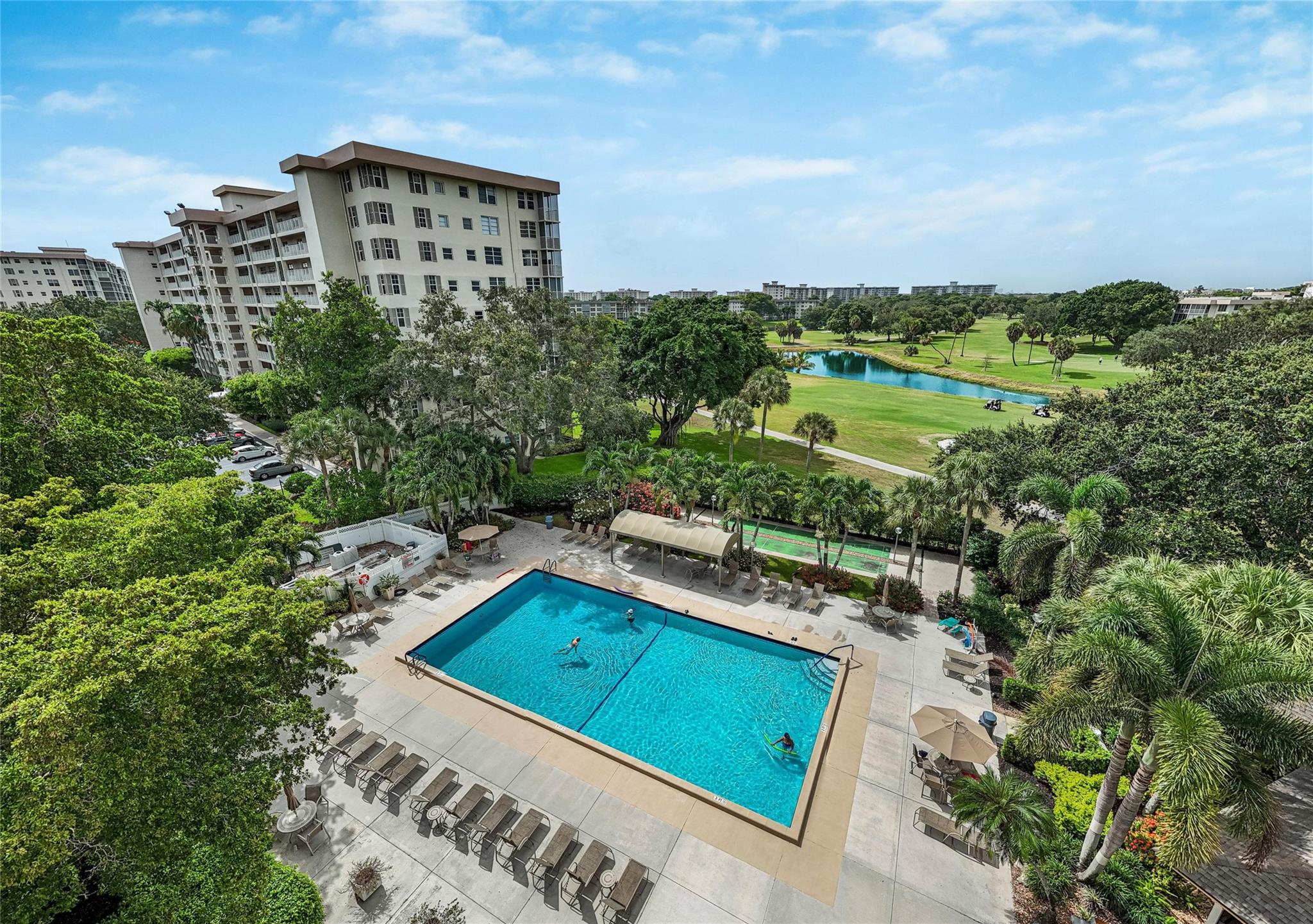 The most sought-after 3BR-2.5BA model boasts 1840 sq. ft. of total comfort on the most beautiful street in all Palm Aire (PA): the Oaks Way. Why would you want to buy this unit? Because: 1) it is on a golf course with a beautiful lake view, 2) has 2.5-year new all hurricane-impact windows and slider doors, 3) it already has the built-in fire sprinklers, 4) the bldg has a BRAND NEW ROOF completed in 1-15-25, 5) the 40 year inspection passed with flying colors, 6) a full-size side X side washer/dryer in the unit, 7) a beautiful, nearly Olympic-size pool with a huge sundeck. 8) A 7yo AC, 9) only a 5-mile drive to the beach or 8 miles to Ft Laud. 10) a golfer's paradise with NO membership required. 11) CABLE & SUPERFAST INTERNET included. And so much more.