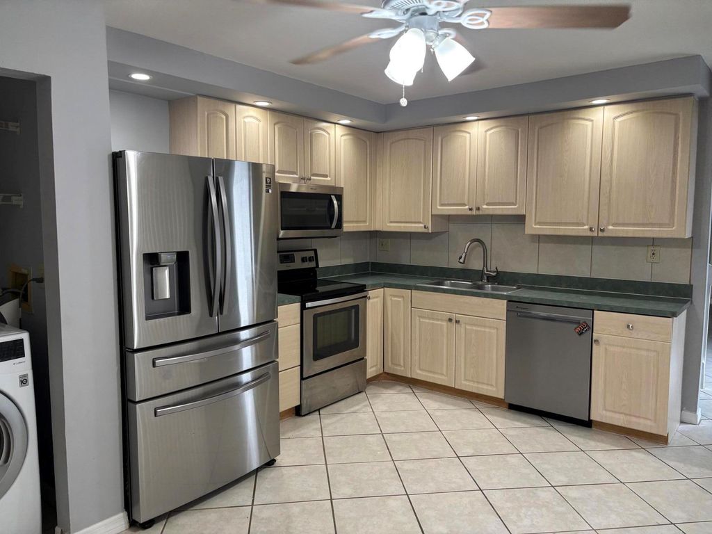 Photo of 352 Prestwick Circle #1, Palm Beach Gardens, FL 33418 (MLS # R11107145)