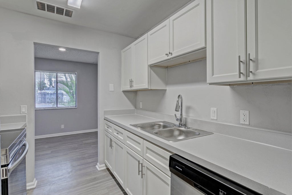 Photo of 9184 Roan Lane, West Palm Beach, FL 33403 (MLS # B26078372)