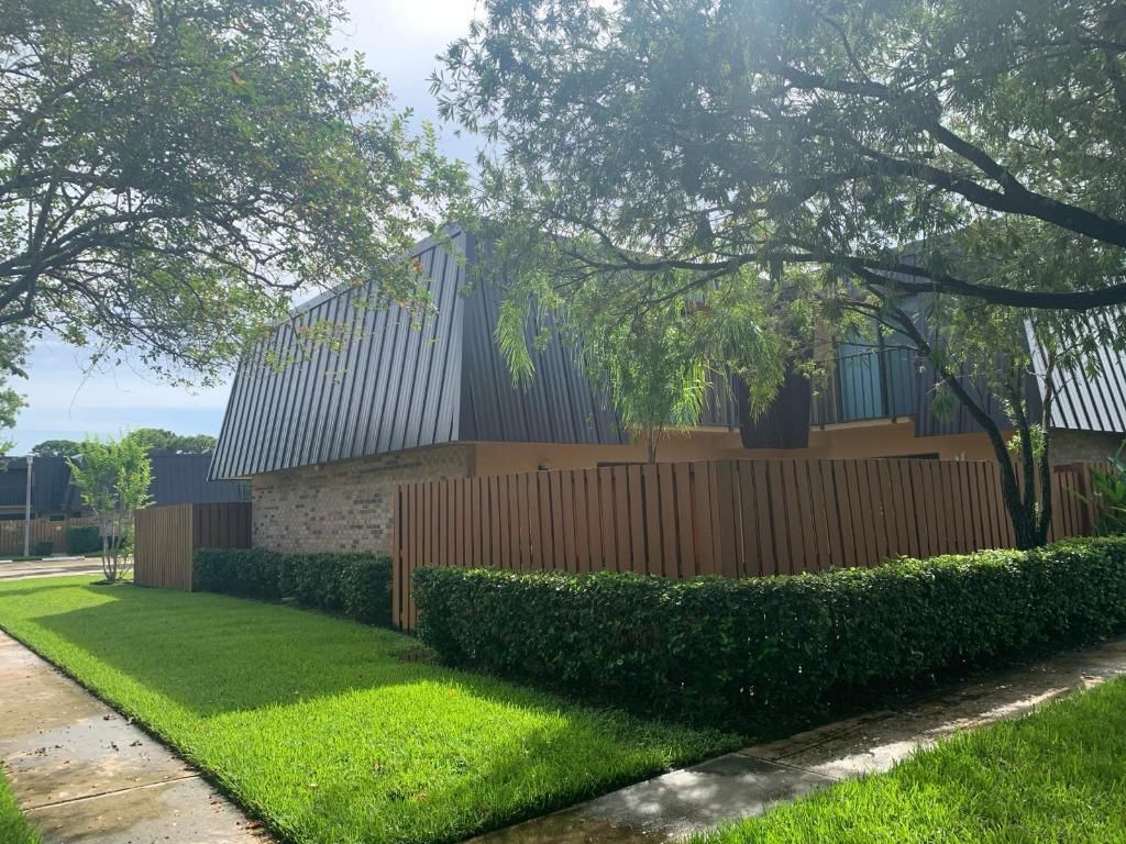 Photo of 5650 SE Windsong Lane #412, Stuart, FL 34997 (MLS # R10976329)