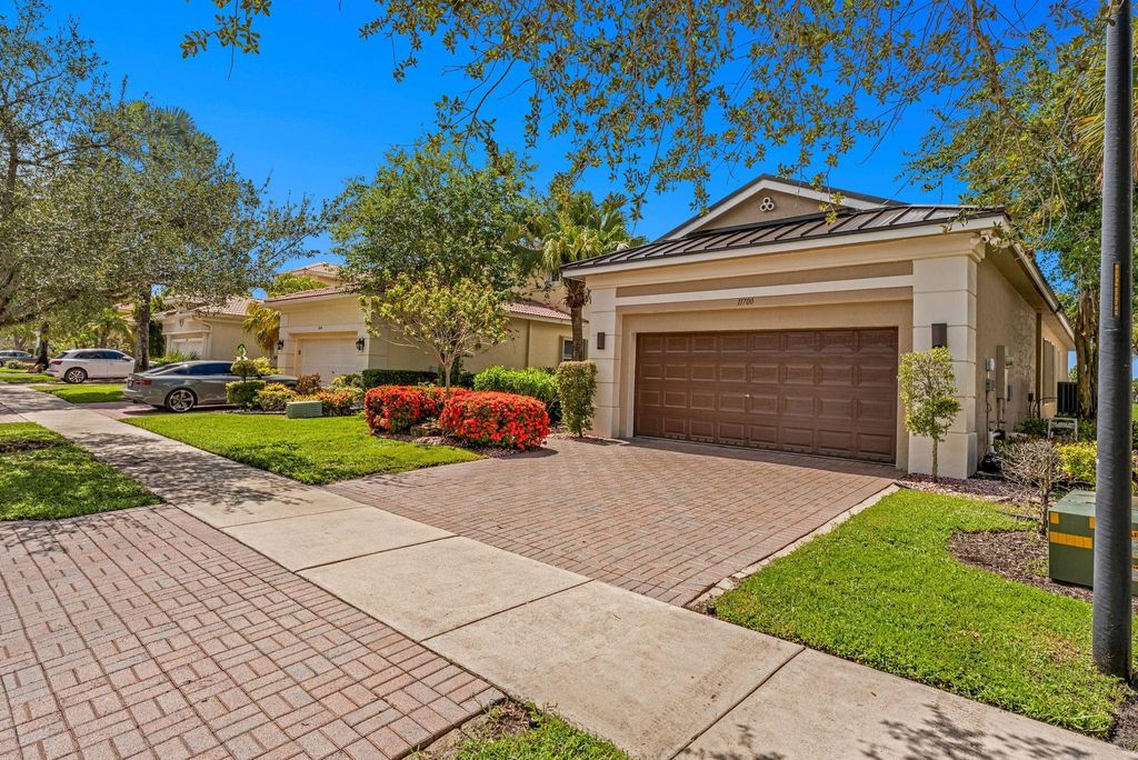 Photo of 11700 NW 71st Place, Parkland, FL 33076 (MLS # F10512608)