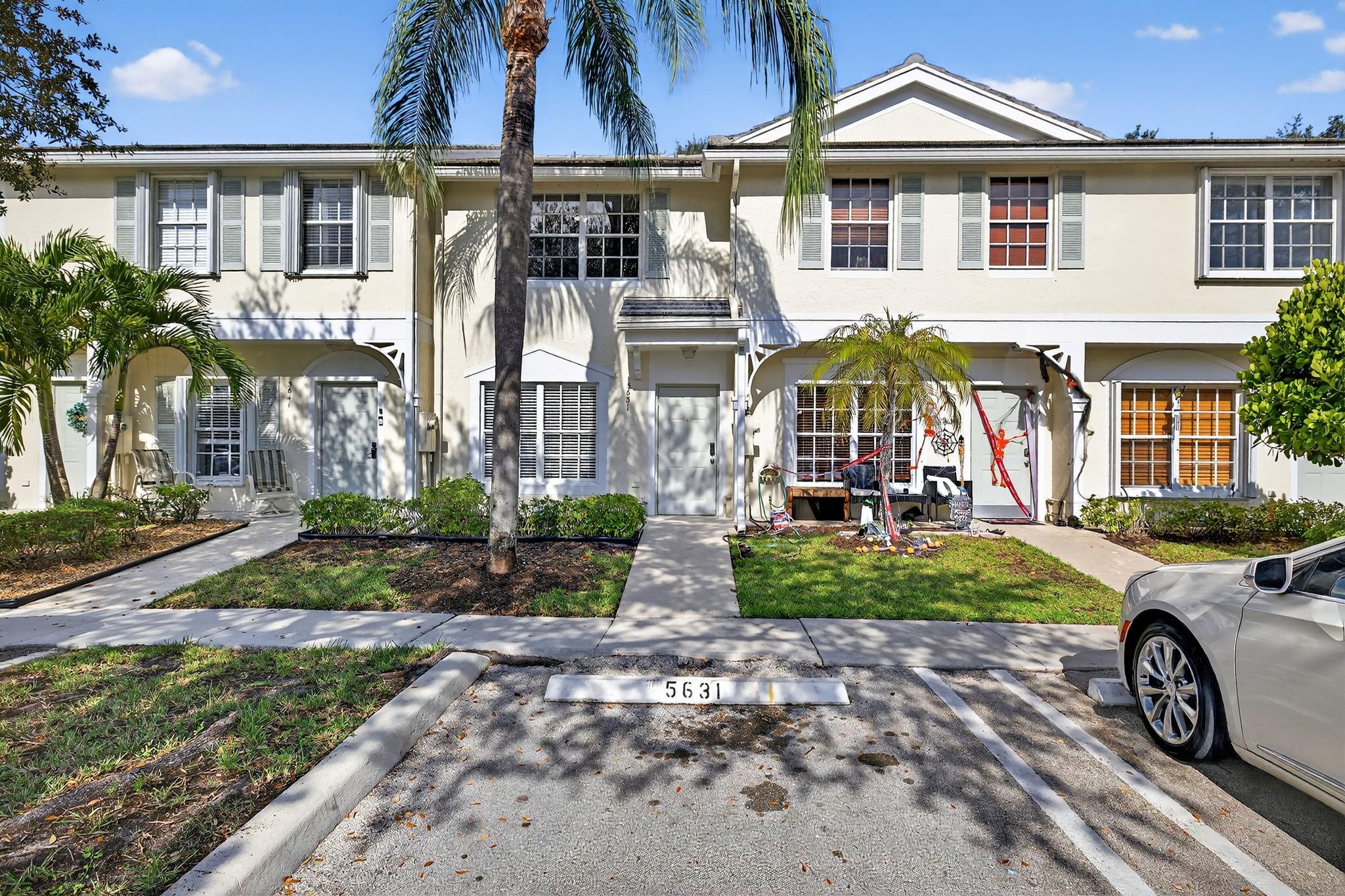 Charming Fee-Simple Townhouse in highly sought after gated community with excellent schools - perfect for investors or those looking to create their perfect, cozy home with endless potential! This home features 2 beds, 1.5 baths, tile downstairs, vinyl plank in the bedrooms & brand-new carpet on stairs. 2020 A/C, Full hurricane protection, low HOA of $384 which includes exterior insurance, roof repairs, lawn, guard gate, pool, playground, basketball and is pet friendly! Great investment opportunity - can rent right away! Walking distance to movies, restaurants, shopping, etc. Whether looking for your new home or next investment opportunity, the possibilities are endless! Information is deemed reliable but not guaranteed. All info and measurements to be verified independently by Buyers.