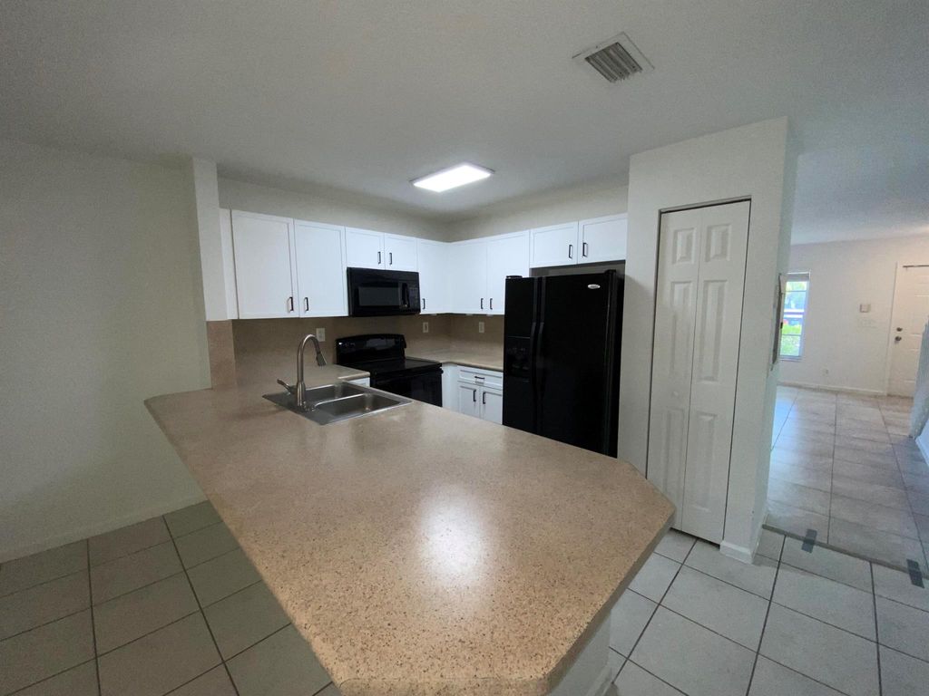Photo of 782 Summit Lake Drive, West Palm Beach, FL 33406 (MLS # R10998675)