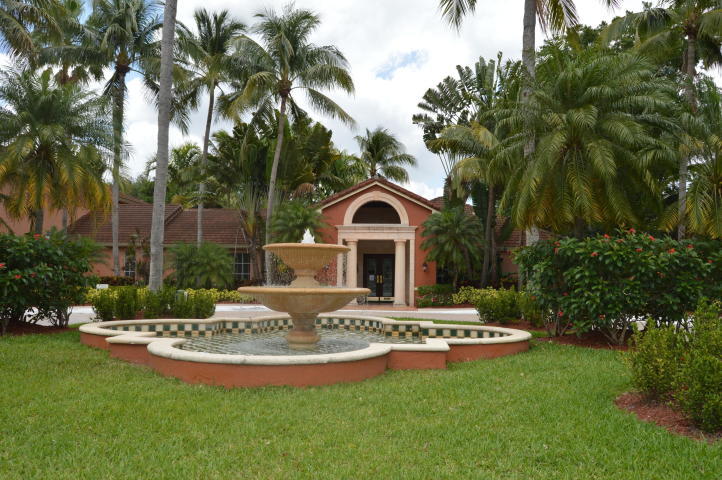 Relaxing living on quiet first floor corner end unit with graden views in the heart of Boca Raton. Furniture can stay or it will be removed. Stainless steel appliances, granite counter tops, screened enclosed patio. Master Bedroom has private balcony. Man gated community with barbeque area, pool, clubhouse, game room, billiard room, tennis, fitness centerbusiness office, covered tiki hut for events and open bar with lounge area.