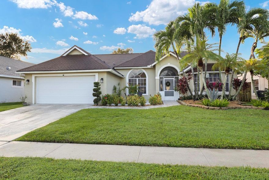 Beautiful 4 bedroom pool home w/ huge bonus room/5th bedroom in gated Meadowland Cove. Gorgeous wood look tile in living areas, separate dining & breakfast nook. Kitchen features granite counters tops, pantry,new dishwasher, & wood cabinets. Primary bedroom retreat has walk in closet, soaking tub, walk in shower, plus dual sinks. Other features include cabana bath,newer water heater (large capacity) w/heat pump to primary bedroom, transferable AC service contract , hurricane impact garage doors.Screened pool w/privacy fence &  lush landscaping. Decorative concrete decking around pool patio & tiled front  walkway on quiet cul de sac lot. The community features a clubhouse w/heated community pool & boat ramp. Perfect location in the heart of Wellington & Equestrian Venues. ''A'' rated schoo