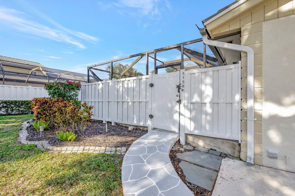 Photo of 5158 Woodruff Lane, Palm Beach Gardens, FL 33418 (MLS # R10970817)