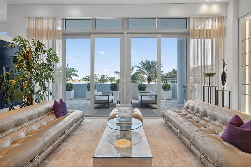 Discover unparalleled luxury in this stunning 3 bedroom condominium, meticulously converted by the original owner from a 3 bedroom layout to create expansive, open living spaces that blend sophistication with comfort. Nestled in a prime waterfront location, this rare gem offers breathtaking, one-of-a-kind water views that captivate from every angle, transforming everyday moments into serene escapes. Step inside to find a thoughtfully designed interior boasting high-end finishes, abundant natural light, and a seamless flow perfect for modern living or entertaining. The gourmet kitchen is equipped with top-of-the-line appliances, custom cabinetry, and a spacious island that opens to the living and dining areas.  Resort living at its finest. ideal for hosting gatherings or simply enjoying the panoramic vistas.

The primary suite features a spa-like en-suite bathroom and an oversized walk-in closet. The true showstopper is the extraordinary (one of a kind for the Water Club) wraparound deck spanning an impressive 1250 square feet. This expansive outdoor oasis wraps around the entire unit, offering endless possibilities for al fresco dining, lounging, or stargazing, all while soaking in those mesmerizing water views that stretch as far as the eye can see.

Whether you're seeking a peaceful waterfront haven or a stylish urban escape, this condominium redefines exclusivity. Opportunities like this don't come oftenschedule your private viewing today and experience the epitome of refined living in this custom oasis.

The Water Club has all of the amenities of a 5 star resort.  Three pools (one is a lap pool), two fully equipped gyms, beach area, two hot tubs, private marina, meeting rooms, Pickleball court, two hotel suites for guests of owners.