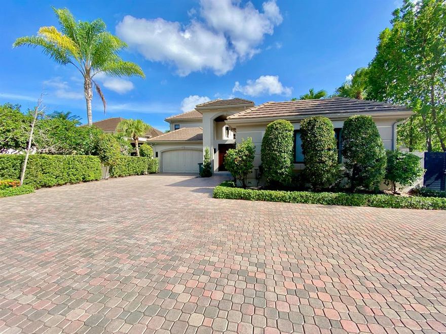 Enter a hidden world of modern luxury and beauty within the award-winning Broken Sound Club. This renovated 5 bedroom 5 1/2 bathroom home features a courtyard that greets you with luxurious Quartzite tile and fully automated modern pool. Entertain outside at the elaborate summer kitchen with a built-in outdoor sound system, and savor the privacy behind the lavish mahogany doors. You will find 15' ceilings in main living area with unique ceiling designs and cove crown moldings throughout. The kitchen boasts Miele, Bosch, and SubZero appliances in the custom kitchen, island and bar. Kitchen features quartz countertops, high-pressure laminate cabinets and full glass backsplash. Large hurricane windows and sliders encourage the sun's energy to fill u