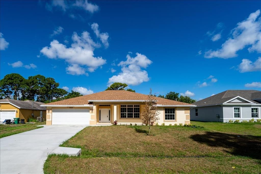 Photo of 2852 SW Collings Drive, Port Saint Lucie, FL 34953 (MLS # R10717343)