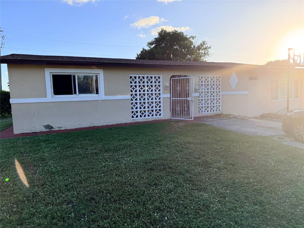 Photo of 8900 NW 26th Pl, Sunrise, FL 33322 (MLS # F10542212)