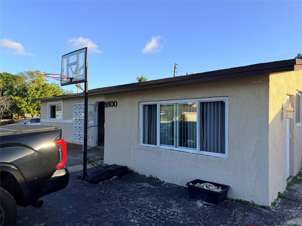 Photo of 8900 NW 26th Pl, Sunrise, FL 33322 (MLS # F10542212)