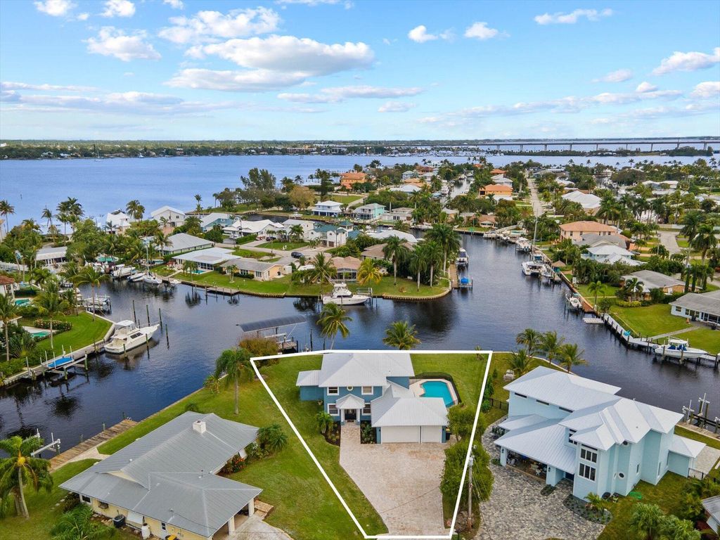Photo of 1673 SW Boatswain Place, Palm City, FL 34990 (MLS # R10950336)