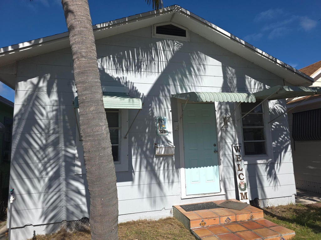 Photo of 329 S M Street, Lake Worth Beach, FL 33460 (MLS # B26062789)