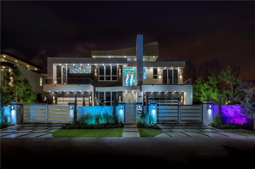 Modern brand new masterpiece, 3 story, 6 bedrooms, 9 bathrooms, office, media room, gym, loft, separate gazebo,huge roof terrace ready for entertaining. Fully smart house, supercharger and lifts in garage, all concrete and steel construction. best construction quality and unique finishes. Custom 10' interior doors, 11' tall insulated and impact glass doors. Brand new sea wall and concrete dock. Oversized pool with pebble tech finish LED and bubblers.Gated property.can be sold completely furnished