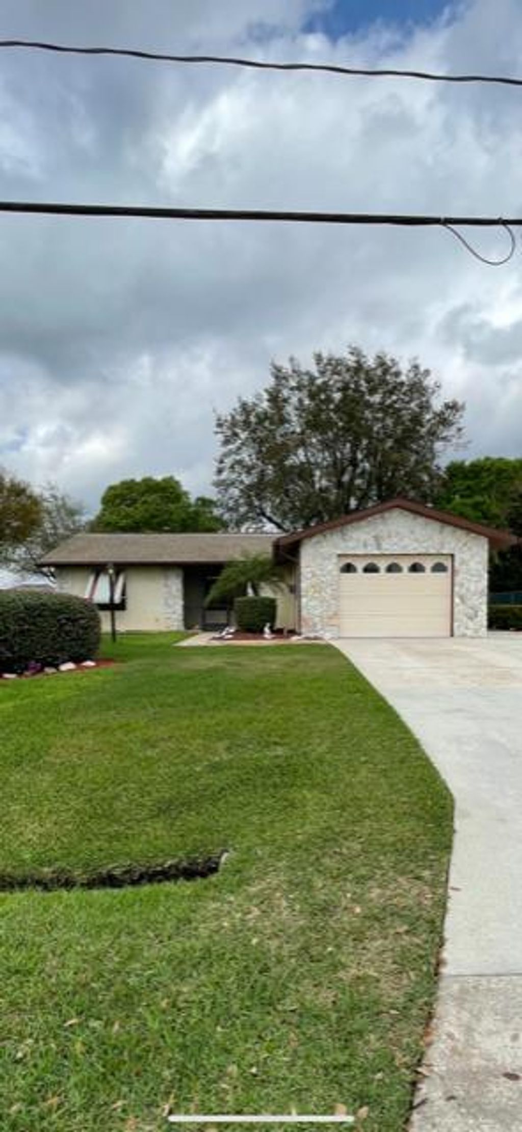 Photo of 731 SE Autumn Ter Terrace, Port Saint Lucie, FL 34953 (MLS # R10693193)