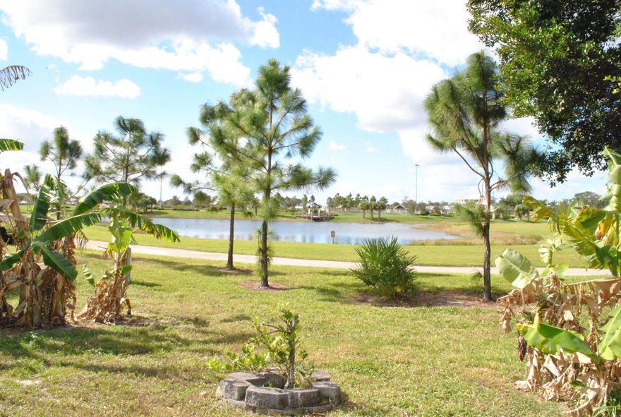 This 3 bedroom, 2 bathroom Single Family Home with 1.5 carport has a great layout. No Home owners association.
Beautiful gunite Pool Home with attached hot spa. Tranquil views of lake with walking trail and wildlife.
Open concept, eat in newer kitchen, updated Bathrooms, large laundry/mud room. Home includes family room, living room, dining room, walk in storage closets. Light and bright home. Real wood floors and tile. 
Fenced Yard. 2 patio area. Has a air conditioned bonus room for office, storage or man cave.