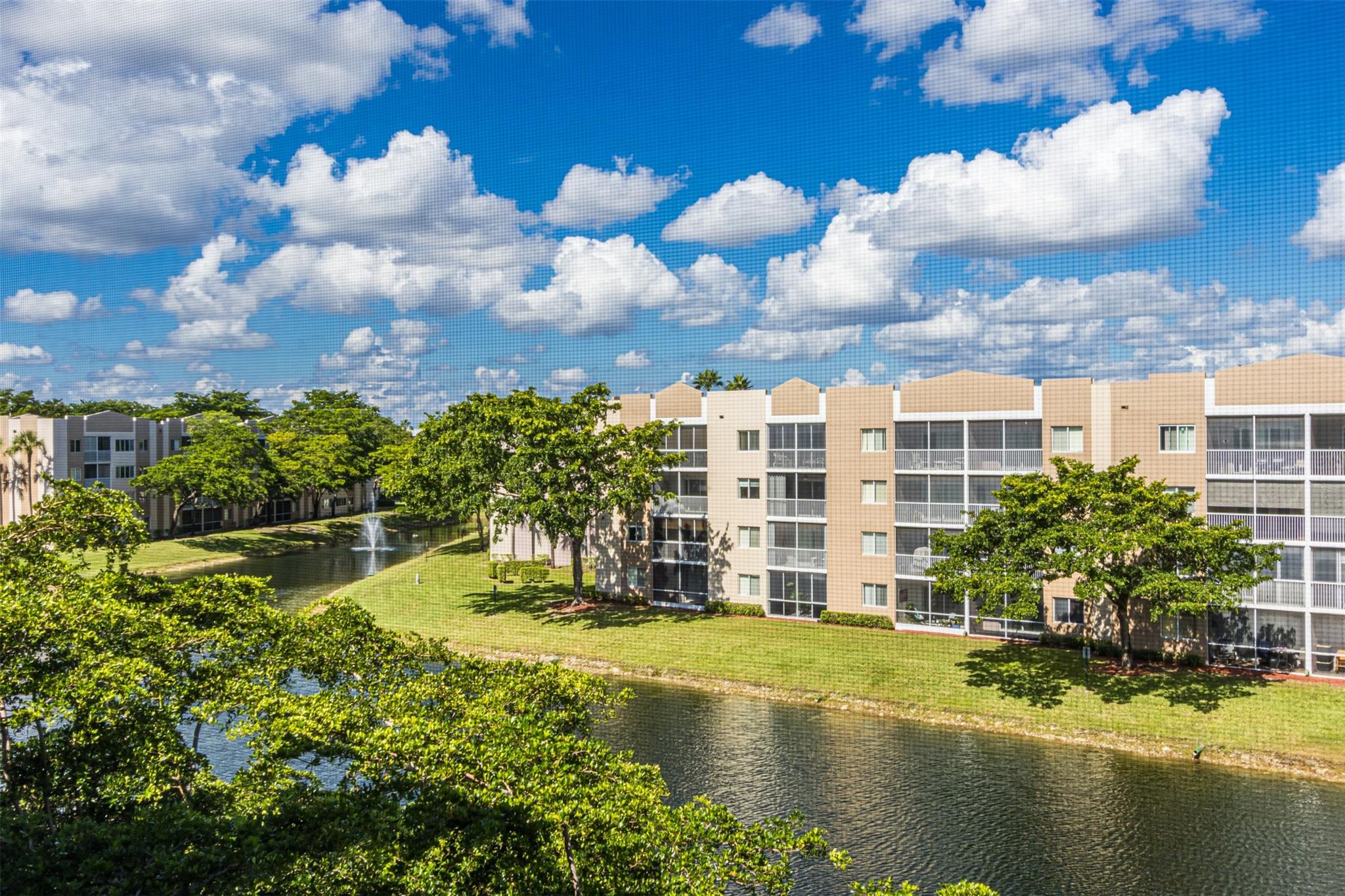 Enjoy peaceful lake views from this spacious 4th-floor condo located in the sought-after Kings Point! This bright and airy 2/2 features a large white kitchen with a convenient pass-through to the living area, perfect for entertaining. The screened, tiled patio offers a relaxing space to enjoy the breezy water views.
Inside, you’ll find tile and vinyl flooring throughout, a generously sized master bedroom with a walk-in closet, and a beautifully updated stand-up shower—all complemented by a serene lake view from the bedroom.
KP offers resort-style living with an incredible array of amenities, a state-of-the-art 1,007-seat venue hosting top entertainment. Residents also enjoy a variety of games and activities.
This property offers comfort, convenience, and a vibrant community lifestyle.