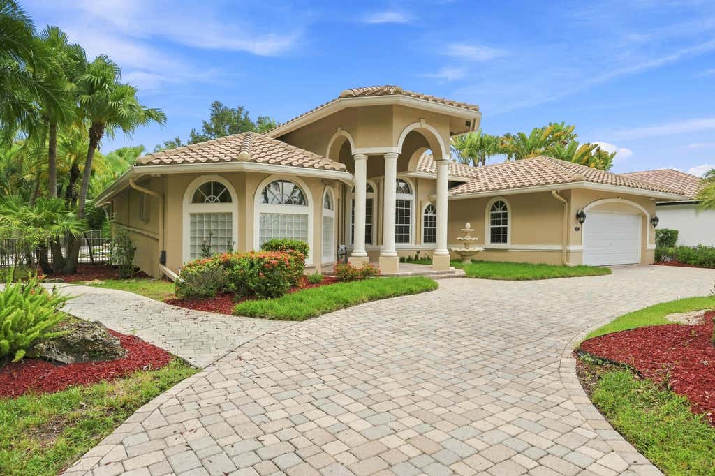 Photo of 11889 NW 12TH Drive, Coral Springs, FL 33071 (MLS # B26061082)