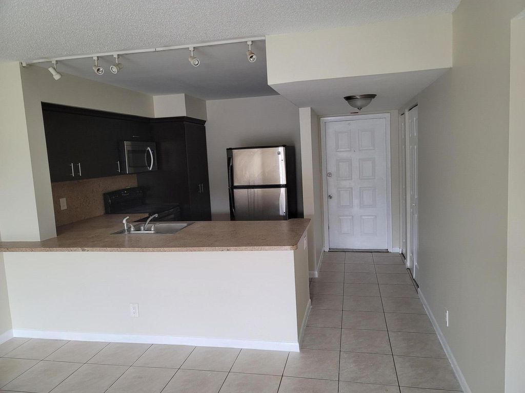 Photo of 3737 N Pine Island Road #249, Sunrise, FL 33351 (MLS # B26011315)
