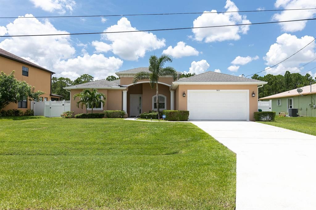 Photo of 5833 NW Zenith Drive, Port Saint Lucie, FL 34986 (MLS # R10734410)