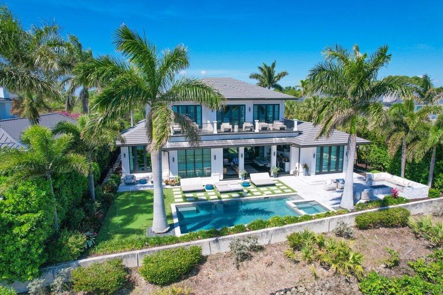 Stunning Waterfront Home in The Floridian National Golf Club.Exceptional opportunity to own a premier waterfront estate in the exclusive Floridian National Golf Club. This elegant residence offers panoramic views of the St. Lucie River and comes fully furnished (some exclusions apply).The home features an open-concept floor plan with abundant natural light, a gourmet kitchen with top-tier appliances, and spacious living and dining areas designed for effortless entertaining. The luxurious primary suite includes river views, a spa-like bath, and private patio access.Enjoy outdoor living year-round with an expansive loggia featuring a summer kitchen, a gas fire pit with seating area, resort-style pool, and a private putting green---perfect for relaxing or hosting.