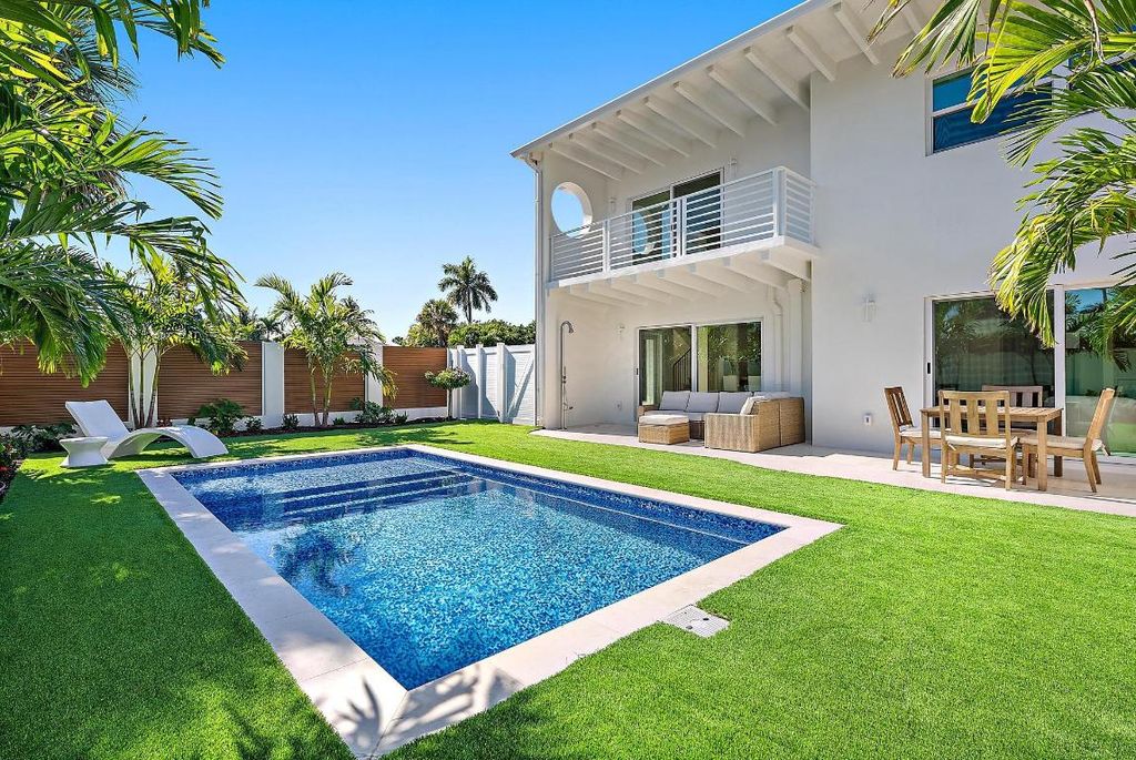 Photo of 107 Sandal Lane #1, Palm Beach Shores, FL 33404 (MLS # R11155469)