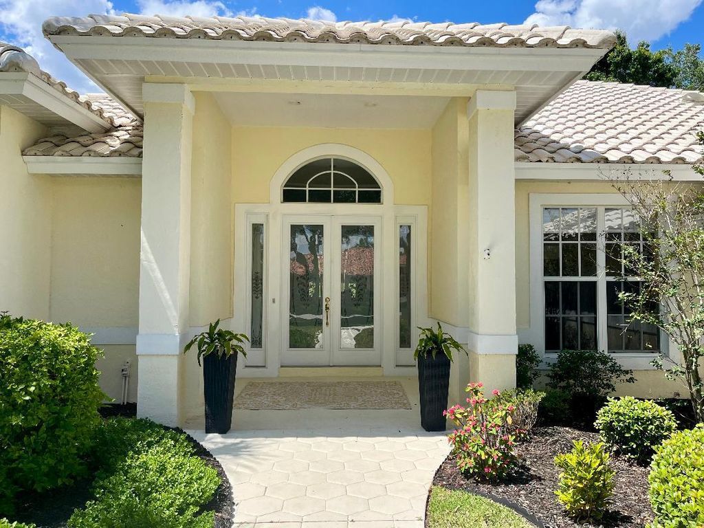 Photo of 1305 SW Bent Pine Cove, Port Saint Lucie, FL 34986 (MLS # B26021314)