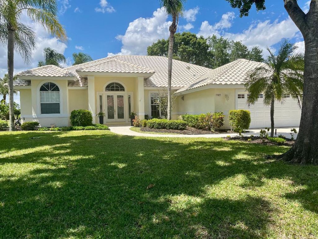 Photo of 1305 SW Bent Pine Cove, Port Saint Lucie, FL 34986 (MLS # B26021314)