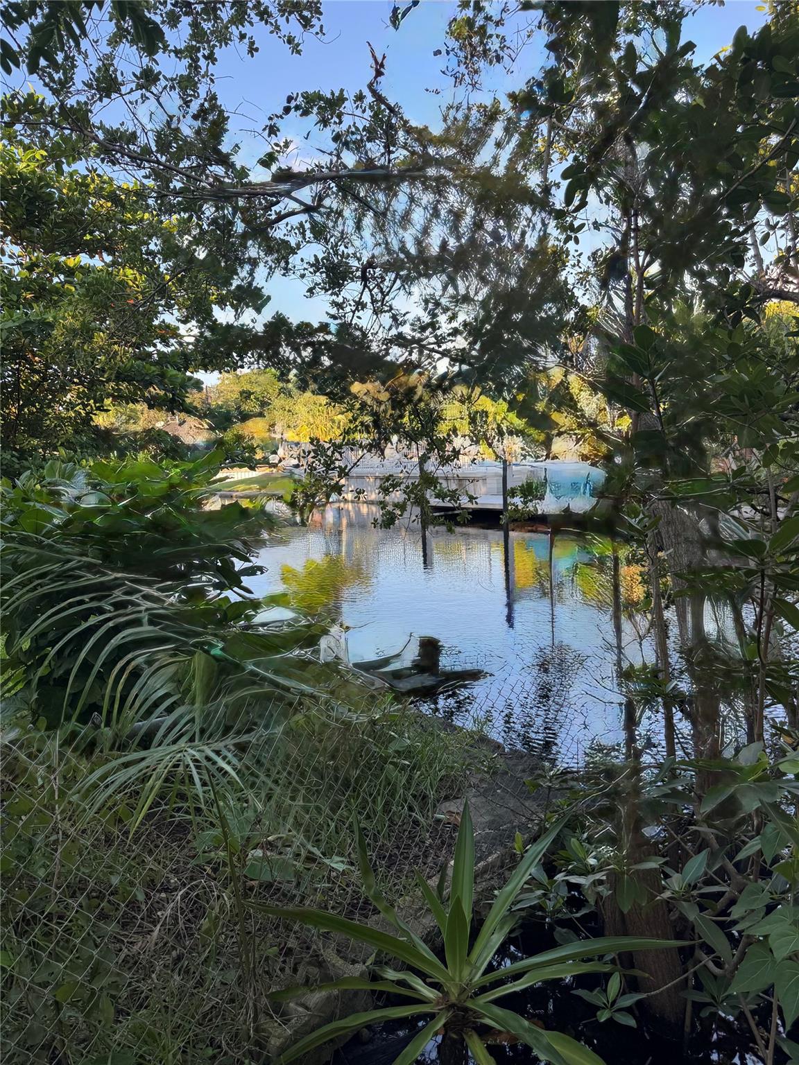 Waterfront RD-15 zoned property in Tarpon River! Ocean-access canal for boating, kayaking, or unwinding with a glass of wine as the sun sets. This property offers a 2/1 with Florida room plus an upstairs 1/1 apartment. Home may be livable and ideal for short-term rental or Airbnb. Zoned for two townhomes, the lot offers flexibility to rebuild, renovate the existing home, or construct new duplex/townhomes. Enjoy the Tarpon River lifestyle—close to Las Olas shopping, Riverwalk, coffee houses, and beach concerts. Newly built million-dollar-plus homes line the street. Minutes from the airport and Brightline trains. This is an up-and-coming neighborhood in Fort Lauderdale!
