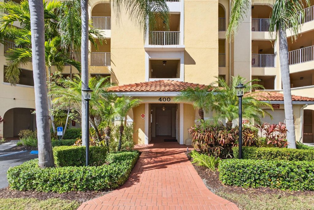 Photo of 400 Uno Lago Drive #103, Juno Beach, FL 33408 (MLS # R11169547)