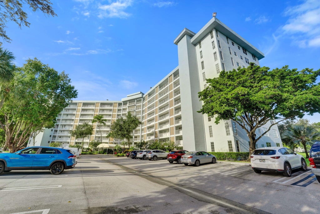 Photo of 3010 N COURSE Drive #312, Pompano Beach, FL 33069 (MLS # B26086513)