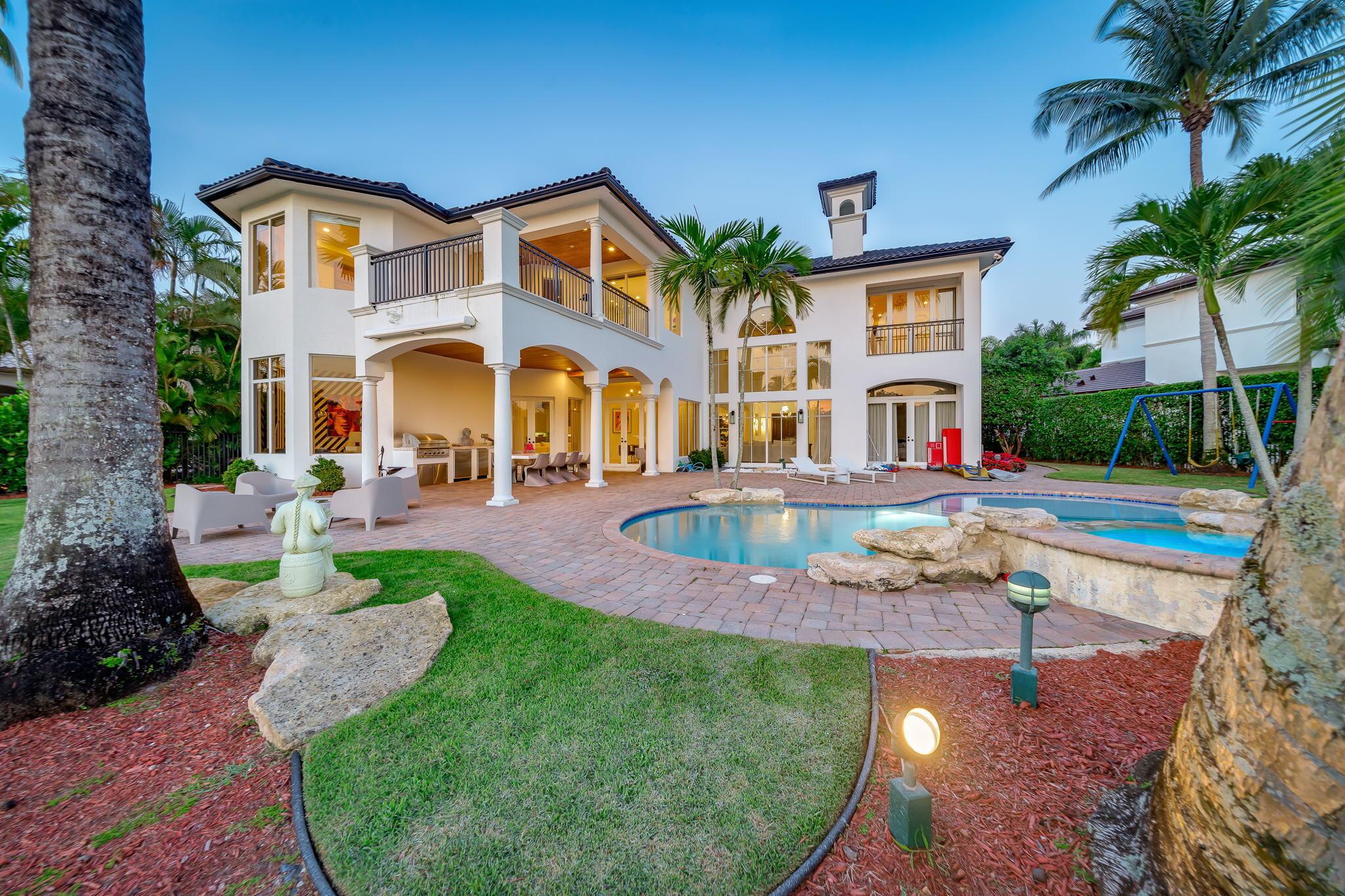 STUNNING CUSTOM BUILT MODERN MEDITERREANEAN LAKEFRONT ESTATE HOME SITUATED AT THE END OF A PRIVATE CUL-DE-SAC ON ONE OF THE BEST LAKE LOTS IN THE OAKS. THIS HOME INCLUDES A MARBLE BALCONY WITH EXPANSIVE LAKE AND POOL VIEWS THAT ALLOWS FOR PERFECT SUNSETS IN THE EVENING. WALK IN AND BE GREETED BY BREATHTAKING SOARING COFFERED CEILINGS AND SUN-FILLED DOUBLE HEIGHT WINDOWS OVERLOOKING THE HEATED RESORT STYLE POOL AND LAKE. THIS SPECIAL FIVE BEDROOM HOME FEATURES A CHEF'S KITCHEN WITH A MASSIVE SIX FOOT SUBZERO REFRIGERATOR, VIKING STOVE AND OVENS, TWO MIELE DISHWASHERS, CUSTOM WOOD CABINETS, GRANITE COUNTERTOPS AND AN EXPANSIVE WALK-IN PANTRY.