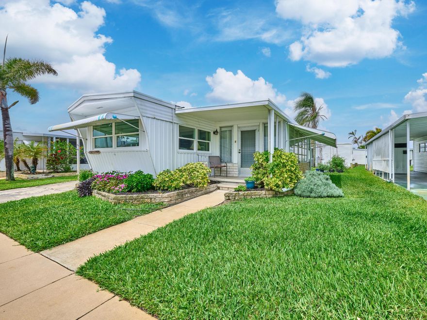 PARADISE FOR BOATERS!! Spacious, light & bright  1 Bedrm/1 Bath expanded singlewide in Hidden Harbour Estates. Step inside & enjoy a thoughtfully updated interior featuring a new Kitchen w shaker, soft close cabinetry, quartz counters, tile backsplash & large peninsula island perfect for entertaining. New A/C 2022, Hot water heater 2026, Appliances 2023 & 2024. Coastal style luxury vinyl plank flooring flows thru-out the home. The LR is large & open to the Kitchen. The Master Bedrm is large w built in storage and updated Master Bath. 55+ Community w $350/Mo. HOA incl Basic Cable, Water/Sewer, Trash, Lawn Care, Recreational Amenities. Boat Club & storage for RV's, boats & Trailers. Deep water dockage up to 42' in Manatee Pocket $3.90/FT/MO. Mins to Ocean/ICW, Shopping, restaurants. NO rentals, Certified Service animals only. YOU OWN THE LAND