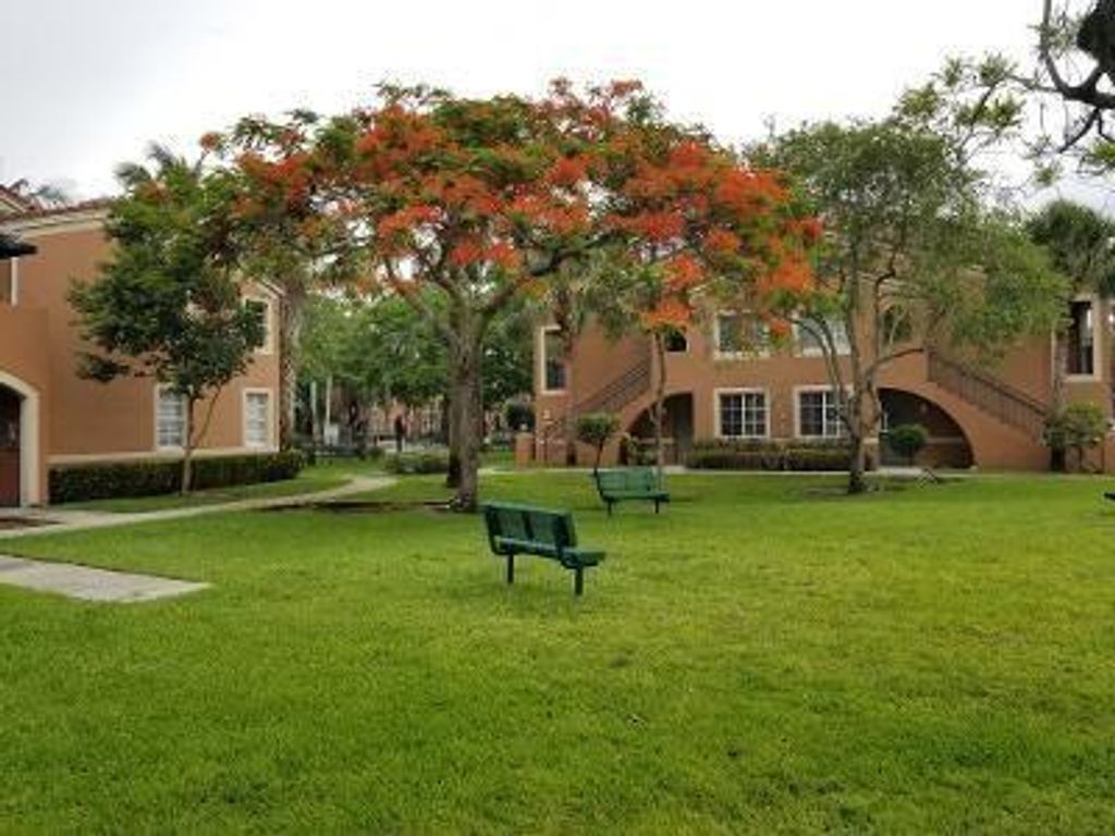 Photo of 7950 N Nob Hill Rd Rd #105, Tamarac, FL 33321 (MLS # F10338613)