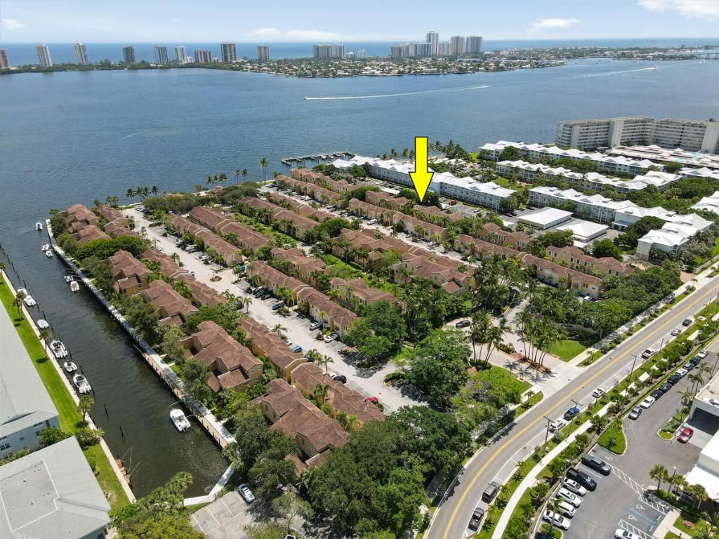 Photo of 1030 Lake Shore Drive #101, Lake Park, FL 33403 (MLS # R11018060)