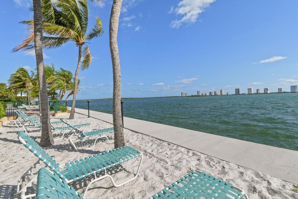 Photo of 1030 Lake Shore Drive #101, Lake Park, FL 33403 (MLS # R11018060)
