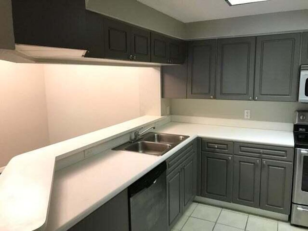 Photo of 3023 Alcazar Place #202, Palm Beach Gardens, FL 33410 (MLS # R10992540)