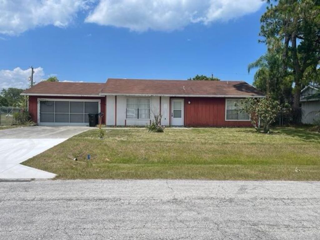 Photo of 811 SE Walters Terrace, Port St Lucie, FL 34983 (MLS # R10890862)