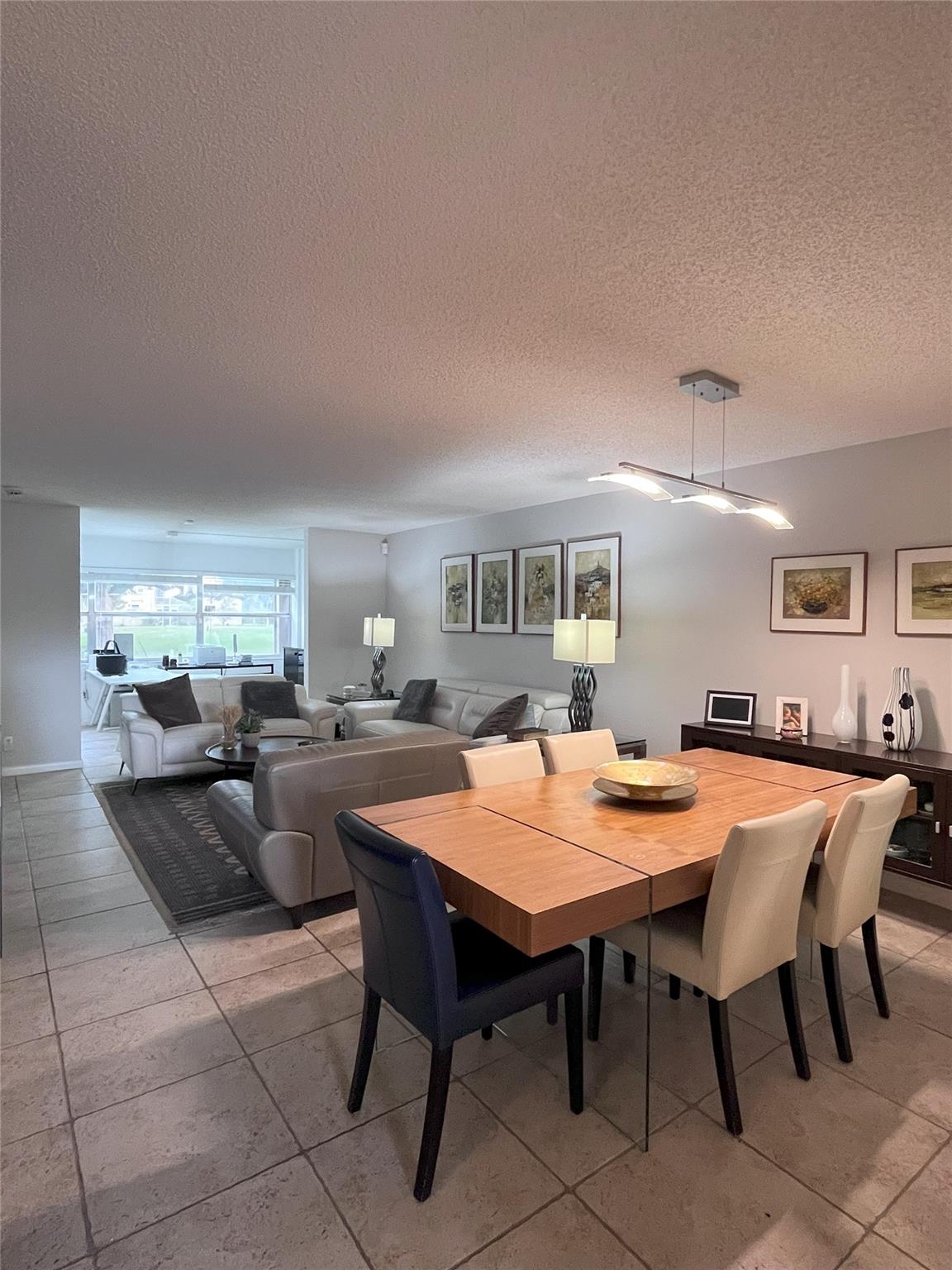 Beautifully remodeled 2 bedrooms 2 bathrooms plus den, ground floor apartment with golf views. Tile in common areas, wood laminate in bedrooms. Brand new refrigerator, A/C two yr old. New roof installed last year. Located in a 55+ community with free golf, tennis, pickleball and racquetball courts, indoor and outdoor pool, Jacuzzi, fitness center, theater and much more!