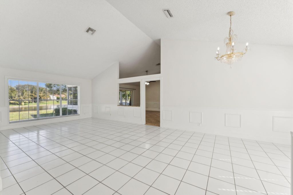 Photo of 3855 Sabal Lakes Road, Delray Beach, FL 33445 (MLS # R11043160)