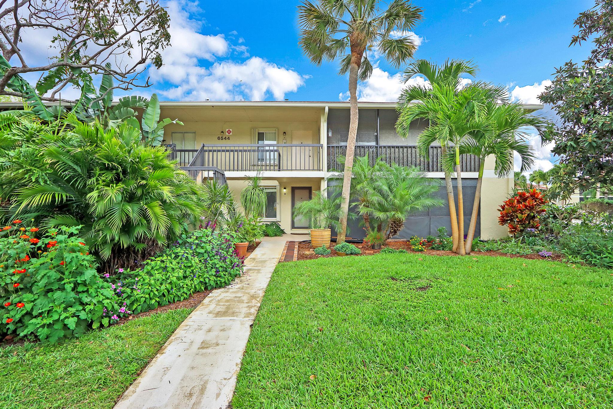 Lovely 2 bedroom/2 bathroom condo in the heart of Jupiter. Features include beautiful updated kitchen with custom wood cabinets and granite countertops, tile throughout, crow molding, fresh paint, spacious screened porch, first floor (no steps), extra storage. The community offers tennis courts, pool and a clubhouse. Close proximity to beach, shopping, I-95 and many Jupiter attractions. Bring your boat and trailer because this community has a gated parking lot for them. Don't miss out on this beauty. Dog friendly. Available for annual lease. Minimum credit score of 650 is required for this community.