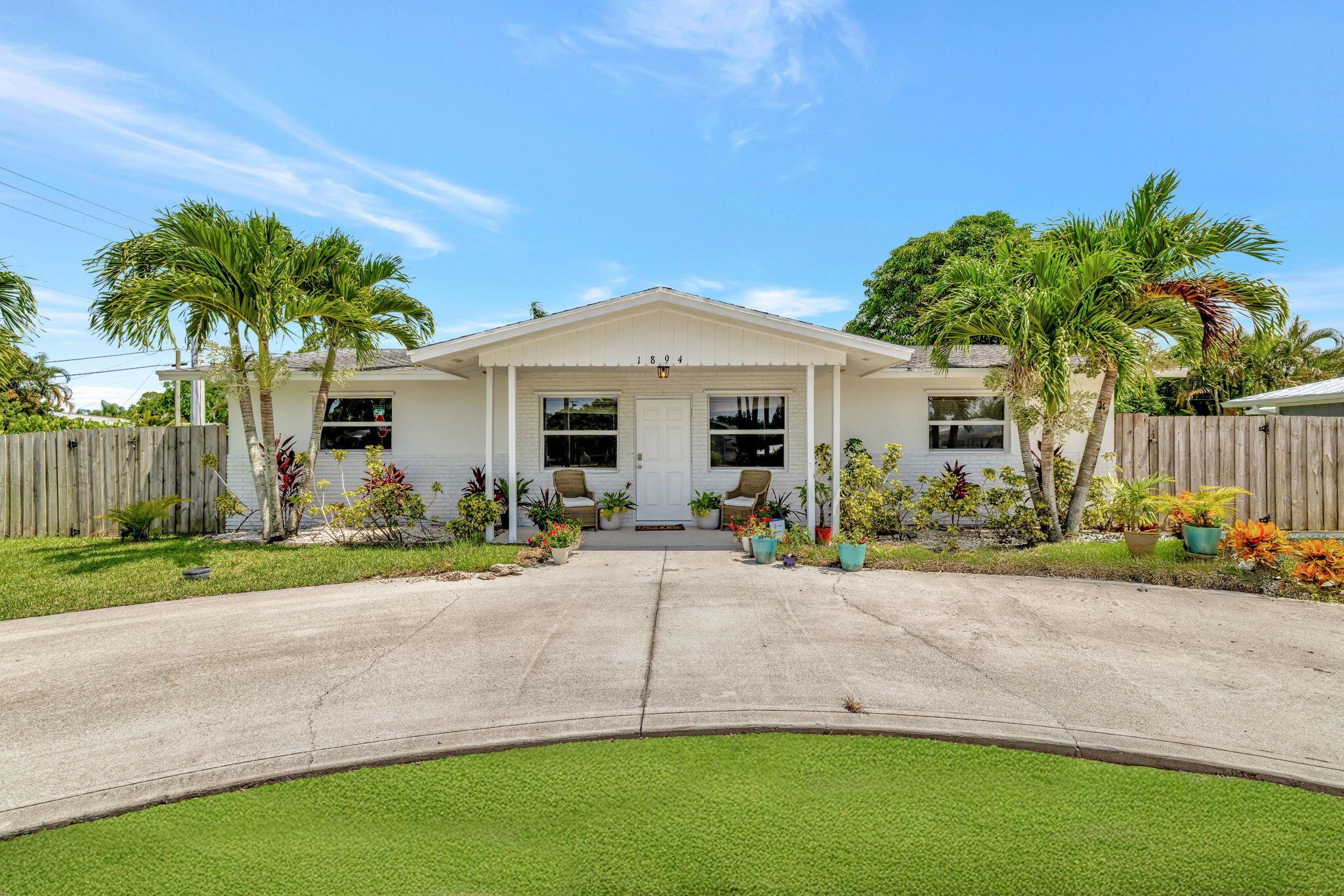 Discover comfort and convenience in this beautifully maintained 3-bedroom, 2-bathroom single-family home located in the desirable Coral Gardens neighborhood. Featuring an open-concept layout with tile flooring throughout, this residence is perfect for everyday living and entertaining. Enjoy a modern kitchen equipped with stainless steel appliances and generous counter space, flowing seamlessly into the spacious living and dining areas. Step outside to a private patio and fenced backyard--ideal for morning coffee or weekend gatherings. Situated on a corner lot, this home offers easy access to top-rated schools, shopping, dining, and parks.