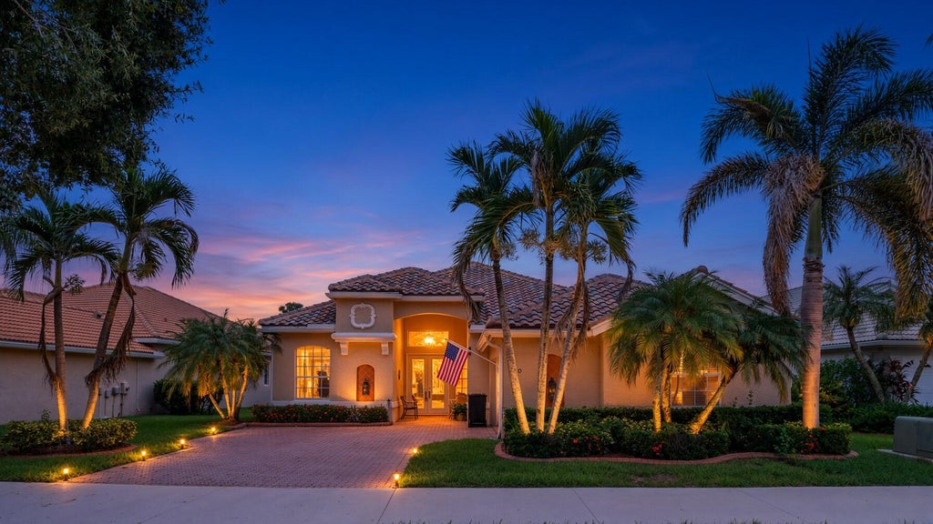 Photo of 700 SW Lake Charles Circle, Port Saint Lucie, FL 34986 (MLS # B26077873)