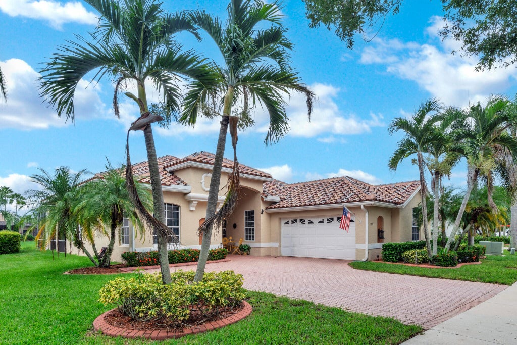 Photo of 700 SW Lake Charles Circle, Port Saint Lucie, FL 34986 (MLS # B26077873)