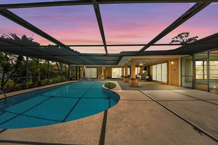 This timeless, custom built, waterfront pool home is truly one of a kind. The home is situated on over half an acre of lush, mature landscaping overlooking the St. Lucie River with ocean access! River Park Marina is located directly across the river with a boat launch, playground and picnic tables. Offering 3 bedrooms, 2 bathrooms and boasting over 3300 living SqFt with a 2 car garage and a massive pool area with a screened in patio and water features; this property was built for an entertaining and relaxing lifestyle. From the cedar wall paneling to the wood burning fireplace, this home has character at every turn. Conveniently located off Prima Vista, close to US1 and only a short drive to I95 or Turnpike. 20 Minutes to the Beach and minutes from Publix and shopping.