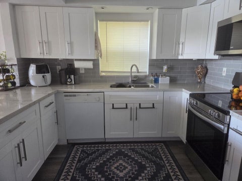 Tiny photo for 3271 NW 44th Street #5, Oakland Park, FL 33309 (MLS # B26076297)